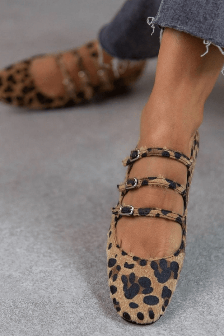 LEOPARDINA | Elegant ballet flats with animal print straps for an irresistible style.